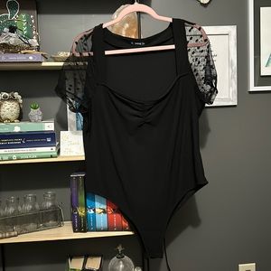 2XL, Ruched front body suit, with Polk-a-dot mesh sleeve detail.